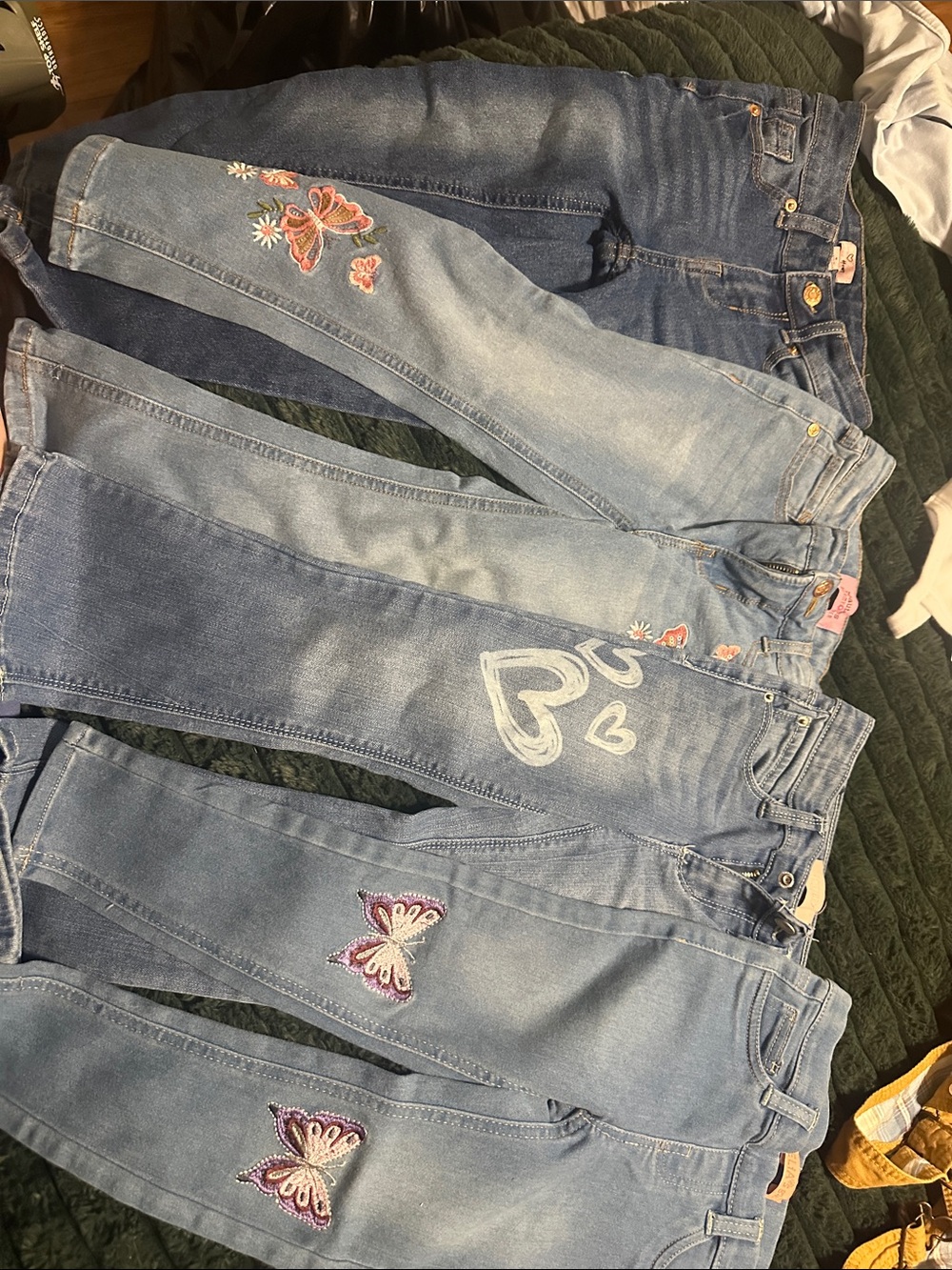 Jeans for girls 3 are size 4 the other one is size 5